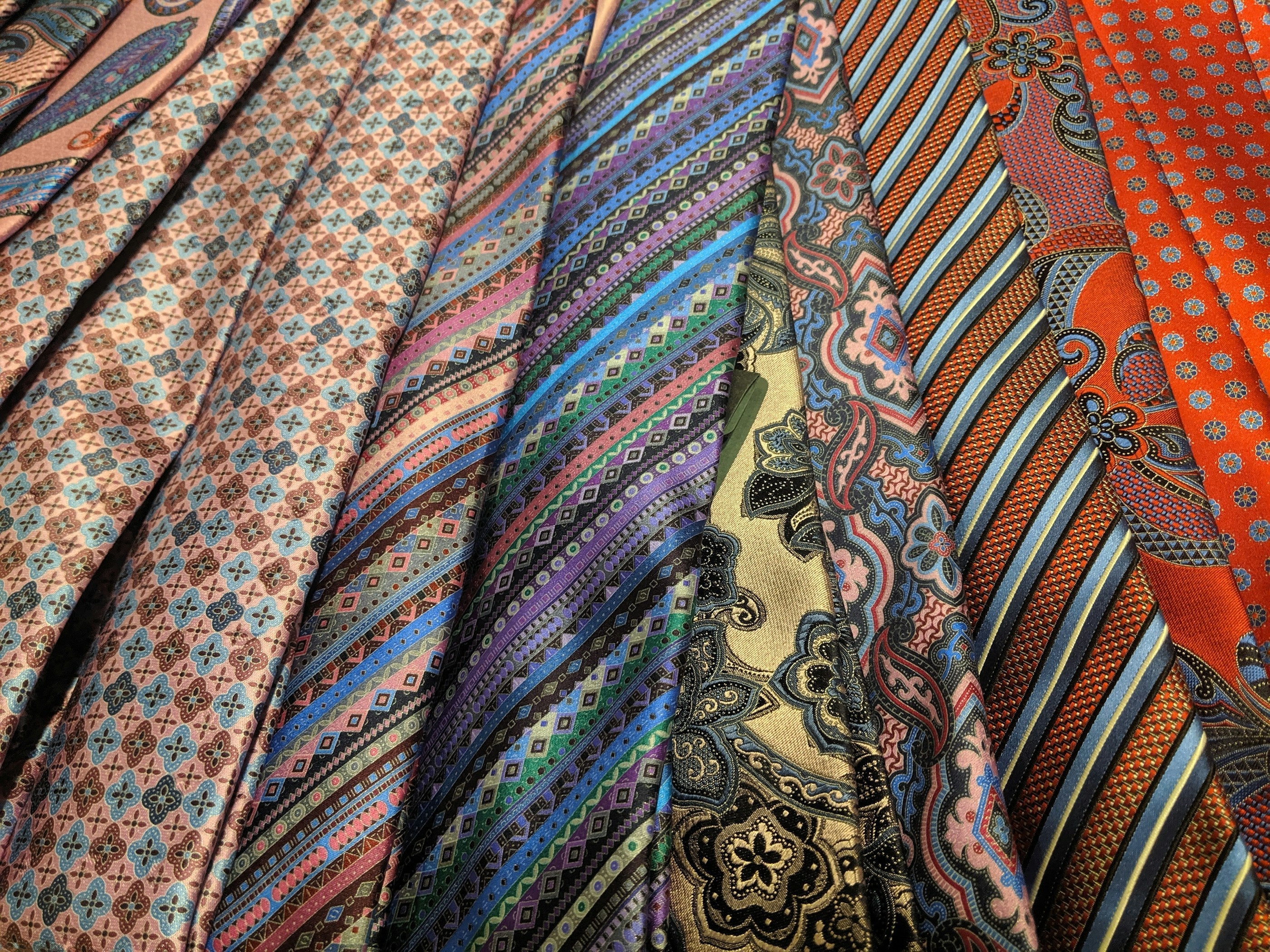 Assorted colorful neckties for weddings and formal events