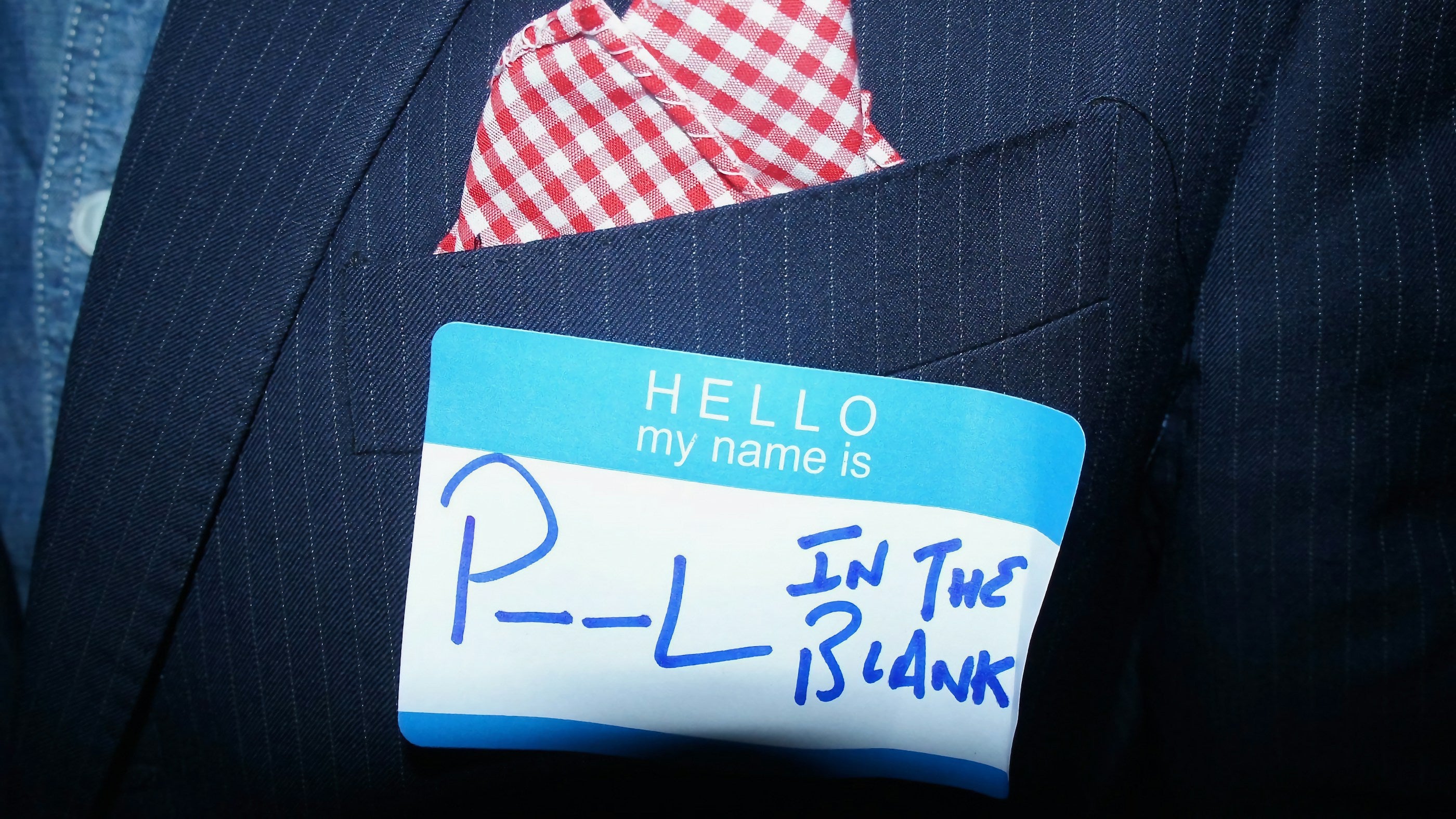 Close-up of a suit with tie and pocket square