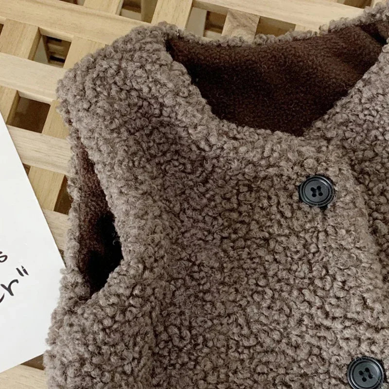 Warm kids button vest in soft faux lamb wool